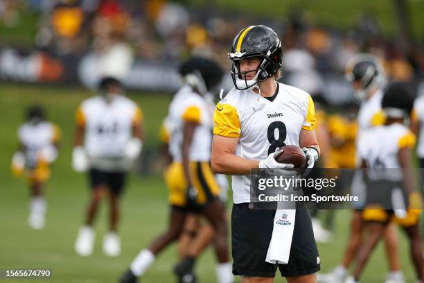 Pittsburgh Steelers quarterback Kenny Pickett participates in a drill during the team's training camp at Saint Vincent College on July 29 in Latrobe,...