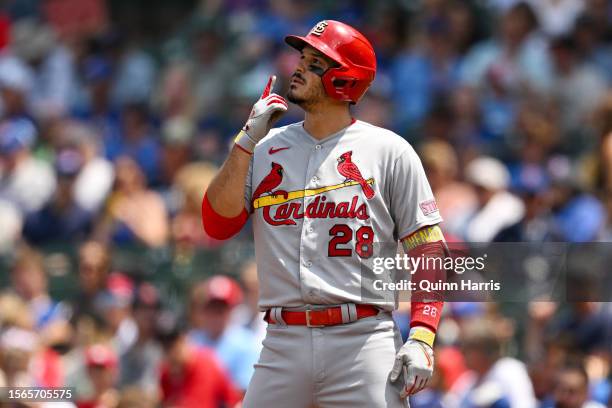 Nolan Arenado of the St. Louis Cardinals reacts at first base after his single in the first inning against the Chicago Cubs at Wrigley Field on July...