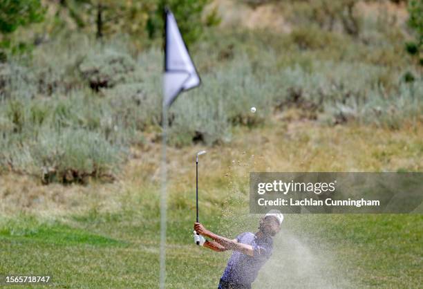 Akshay Bhatia of the United States plays a shot from a bunker on the first hole during the final round of the Barracuda Championship at Tahoe...