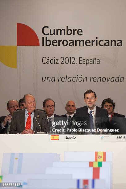 Spain's Prime Minister Mariano Rajoy speaks during a plenary session next to King Juan Carlos of Spain on the last day of the XXII Ibero-American...