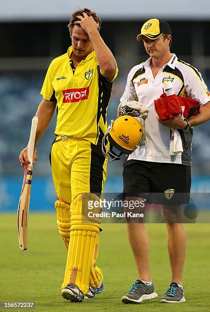 Mitchell Marsh of the Warriors leaves the field with an unconfirmed hamstring injury during the Ryobi Cup One Day match between the Western Australia...