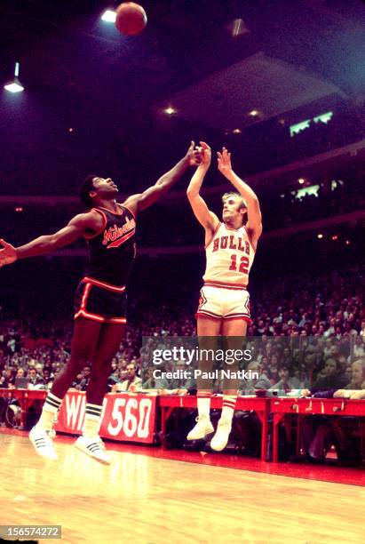American basketball player Rick Adelman of the Chicago Bulls takes a jump shot during a game against the Milwaukee Bucks, Chicago, Illinois, early to...