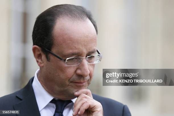 French President Francois Hollande gives a press conference following a meeting with Syrian opposition chief on November 17, 2012 at the Elysee...