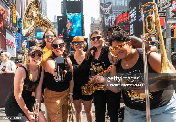 Brass Queens poses at Governor Kathy Hochul announcement of the Music Under New York Riders Choice Award Ceremony on Times Square. The winner was...