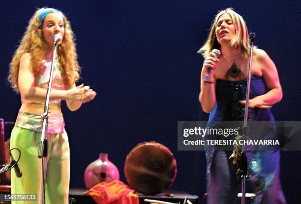 Argentinian singers Viviana Pozzebon and Marcela Benedetti participate in a show on August 22, 2001 in the National Theater in San Jose, Costa Rica....