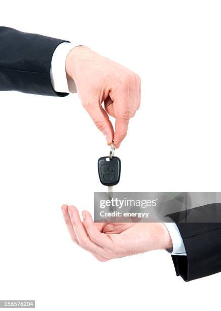 men gives car key - car keys on white stock pictures, royalty-free photos & images