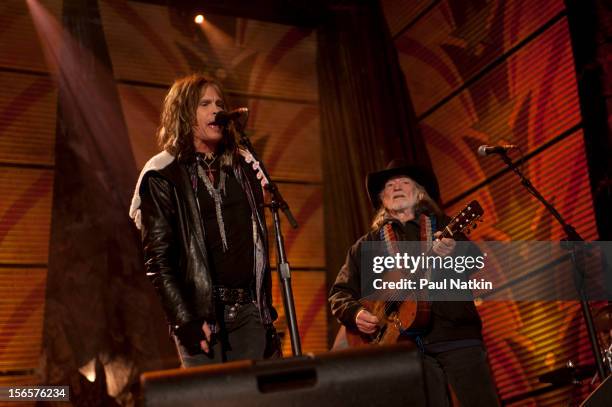 American musicians Steven Tyler and Willie Nelson perform at the Farm Aid 25th Anniversary Concert at Miller Park, Milwaukee, Wisconsin, October 2,...