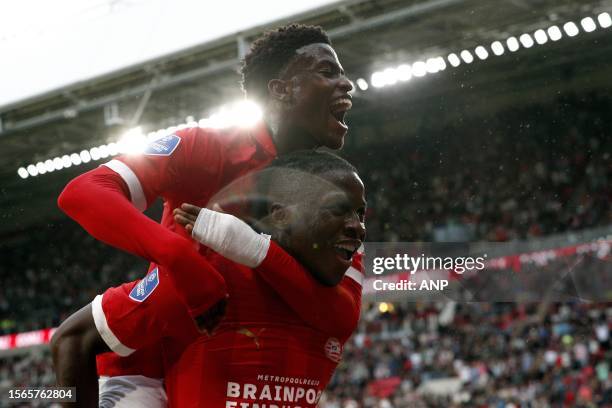 Johan Bakayoko of PSV Eindhoven celebrates the 1-0 with his teammates during the friendly match between PSV Eindhoven and Nottingham Forest FC at...