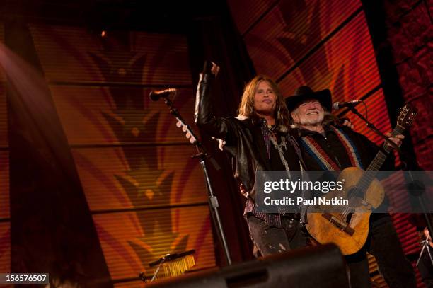 American musicians Steven Tyler and Willie Nelson perform at the Farm Aid 25th Anniversary Concert at Miller Park, Milwaukee, Wisconsin, October 2,...