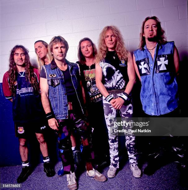 Portrait of British heavy metal band Iron Maiden backstage at the UIC Pavillion during their Brave New World Tour, Chicago, Illinois, October 17,...