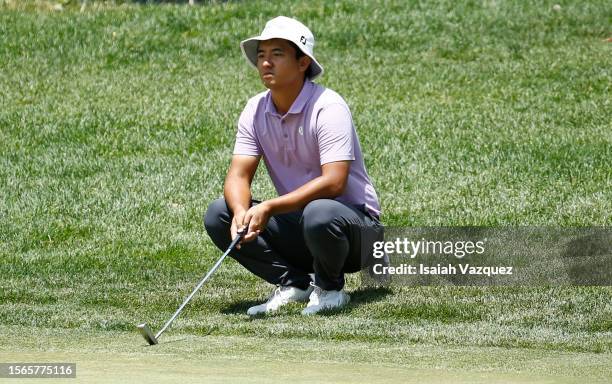 Zecheng Dou of China lines up a putt on the 18th green during the final round of the Barracuda Championship at Tahoe Mountain Club on July 23, 2023...