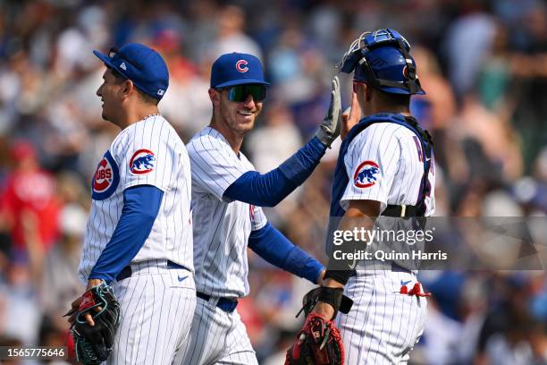 Cody Bellinger and Miguel Amaya of the Chicago Cubs celebrate after a 7-2 win against the St. Louis Cardinals at Wrigley Field on July 23, 2023 in...