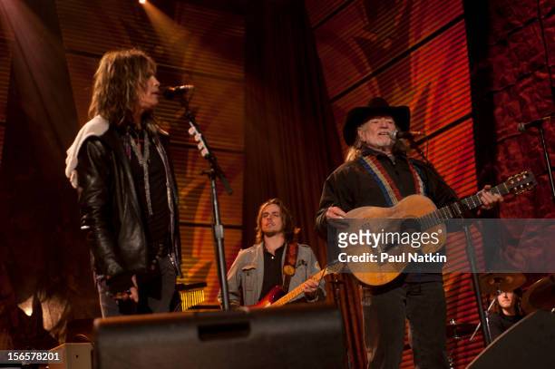 American musicians Steven Tyler and Willie Nelson perform at the Farm Aid 25th Anniversary Concert at Miller Park, Milwaukee, Wisconsin, October 2,...