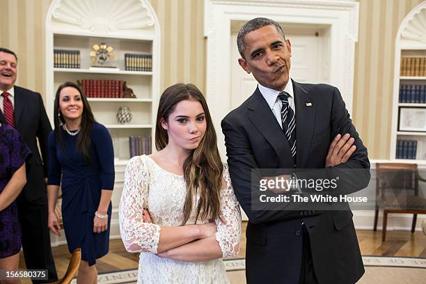 In this handout image provided by The White House, U.S. President Barack Obama jokingly mimics U.S. Olympic gymnast McKayla Maroney's "not impressed"...