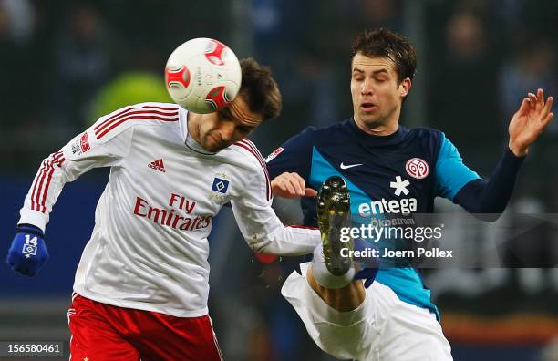 Milan Badelj of Hamburg and Andreas Ivanschitz of Mainz compete for the ball during the Bundesliga match between Hamburger SV and 1. FSV Mainz 05 at...