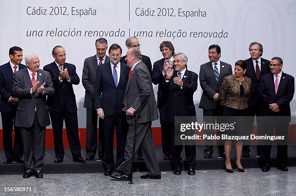 King Juan Carlos of Spain walks in front of President Ollanta Humala of Peru, President Ricardo Martinelli of Panama, President Felipe Calderon of...