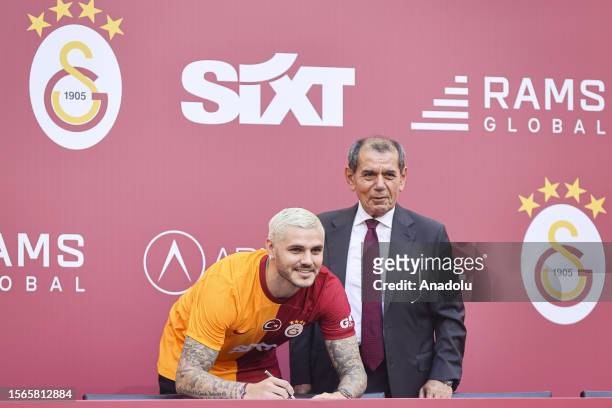Galatasaray Club President Dursun Ozbek and Argentine footballer Mauro Icardi attend the signing ceremony for the new transfers of Galatasaray...