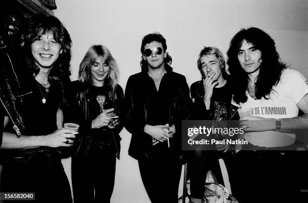 Portrait of British heavy metal band Iron Maiden backstage at Pointe East during their Killer World Tour, Lynwood, Illinois, June 26, 1981. Pictured...