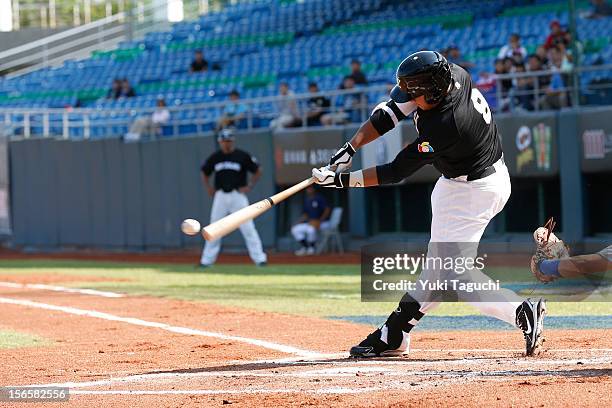 Boss Moanaroa of Team New Zealand hits an RBI single in the top of the first inning of Game 3 of the 2013 World Baseball Classic Qualifier against...