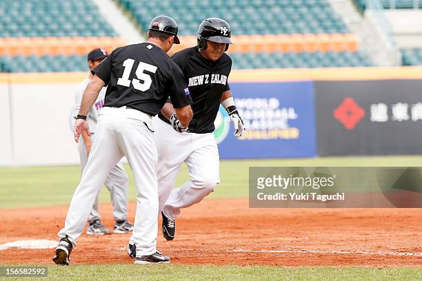 Boss Moanaroa of Team New Zealand rounds the bases after hitting a home run in the top of the eighth inning during Game 3 of the 2013 World Baseball...
