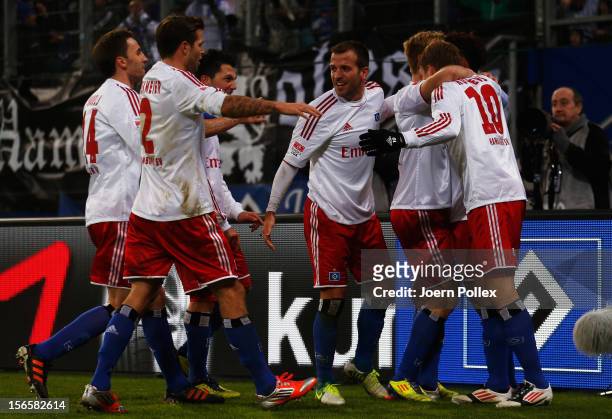 Heung Min Son of Hamburg celebrates with his team mates after scoring his team's first goal during the Bundesliga match between Hamburger SV and 1....