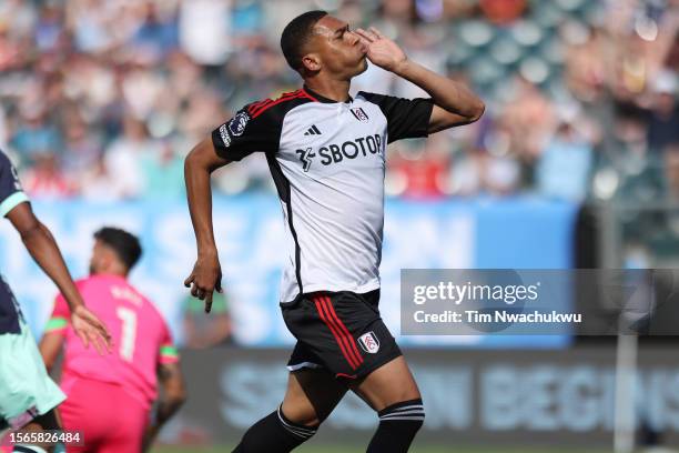 Carlos Vinícius of Fulham FC celebrates after scoring a goal in the second half during a Premier League Summer Series match between Brentford FC and...