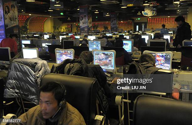 Customers surf the internet at an internet bar in Beijing on January 15, 2009. China is casting an increasingly wary eye over the Internet and its 50...