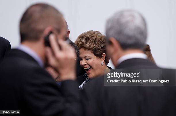 President of Brazil Dilma Rousseff laughs while waiting to pose for a group picture during the last day of the XXII Ibero-American Summit at Congress...