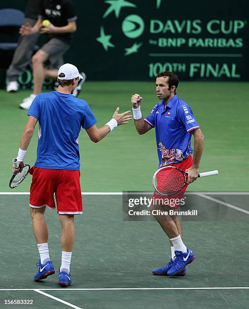 Radek Stepanek and Tomas Berdych of Czech Republic celebrate a point during their doubles match against Marc Lopez and Marcel Granollers of Spain...