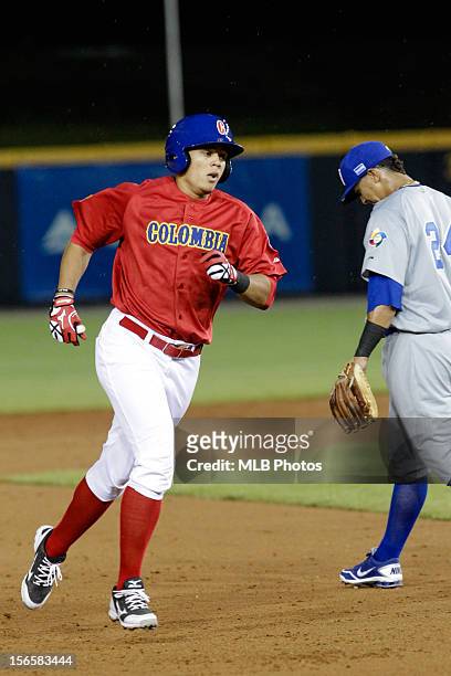 Giovanny Urshela of Team Colombia rounds the bases after hitting a solo home run in the bottom of the fourth inning during Game 2 of the Qualifying...