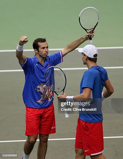 Radek Stepanek and Tomas Berdych of Czech Republic celebrate match point after their four set victory in their doubles match against Marc Lopez and...