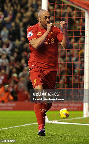 Jose Enrique of Liverpool celebrates his goal during the Barclays Premier League match between Liverpool and Wigan Athletic at Anfield on November...