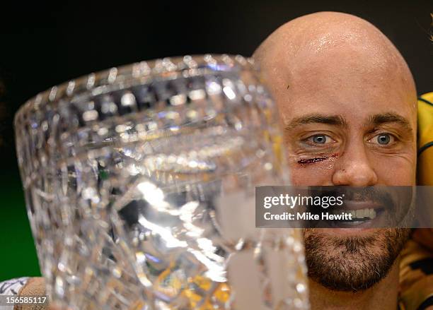 Captain Nathan Sharpe of Australia lifts the Cook Cup during the QBE International match between England and Australia at Twickenham Stadium on...