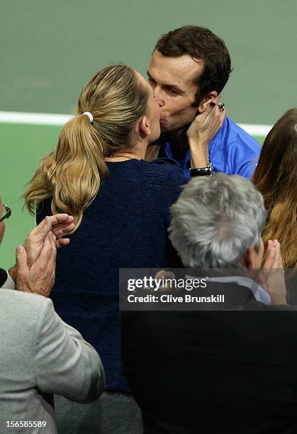Nicole Vaidasova kisses her husband Radek Stepanek after his and Tomas Berdych's four set victory in their doubles match against Marc Lopez and...