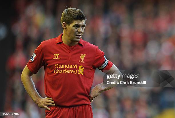 Steven Gerrard of Liverpool looks on during the Barclays Premier League match between Liverpool and Wigan Athletic at Anfield on November 17, 2012 in...