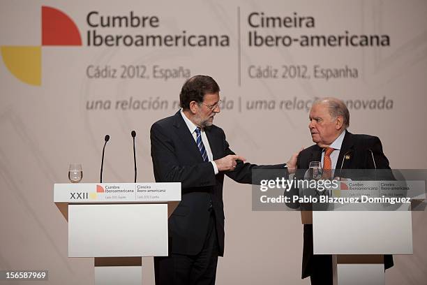 President of Spain Mariano Rajoy gestures to Secretary-General of the Ibero-American Secretariat Enrique Iglesias during press conference at the end...