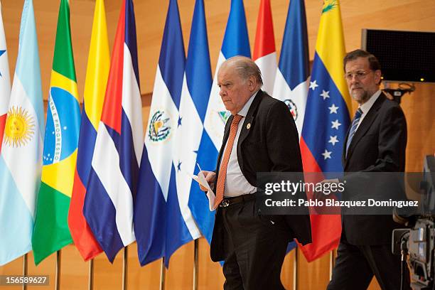 Secretary-General of the Ibero-American Secretariat Enrique Iglesias and President of Spain Mariano Rajoy arrive to a press conference at the end of...