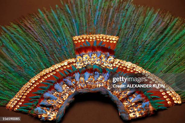 The Penacho feather headdress allegedly worn by Aztec emperor Moctezuma II is displayed at the Museum fur Volkerkunde in Vienna on November 16, 2012....