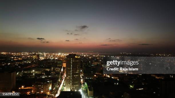 karachi skyline at night - karachi stock pictures, royalty-free photos & images