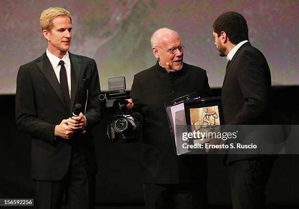 Director Claudio Giovannesi with his award for Best Debut and Second Film for 'Ali Ha Gli Occhi Azzurri' with Jury President Matthew Modine and...