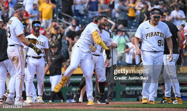 Josh Palacios of the Pittsburgh Pirates reacts after hitting a walk-off, two-run home run in the 10th inning for a 6-4 win over the Philadelphia...