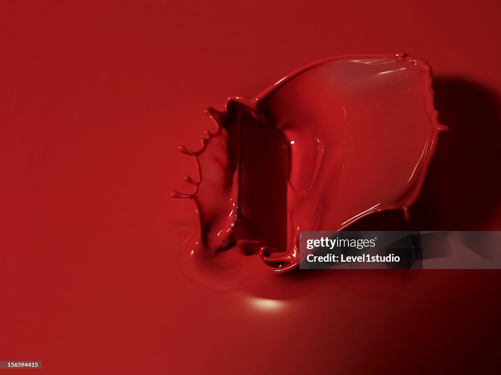 Red liquid splashing