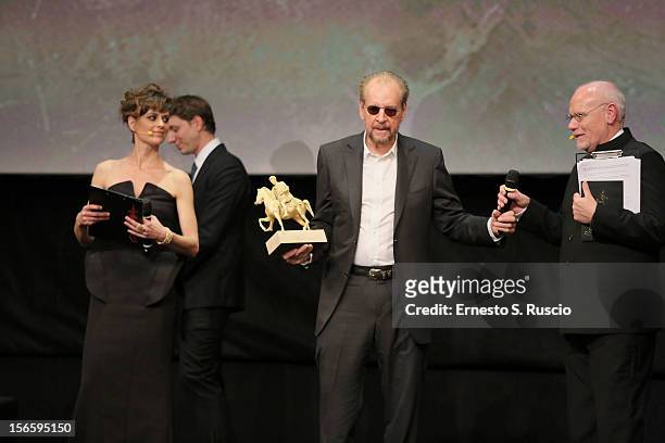 Director Larry Clark poses on stage with Golden Marc ’Aurelio for Best Film 'Marfa Girl' during the Awards Ceremony at the 7th Rome Film Festival at...