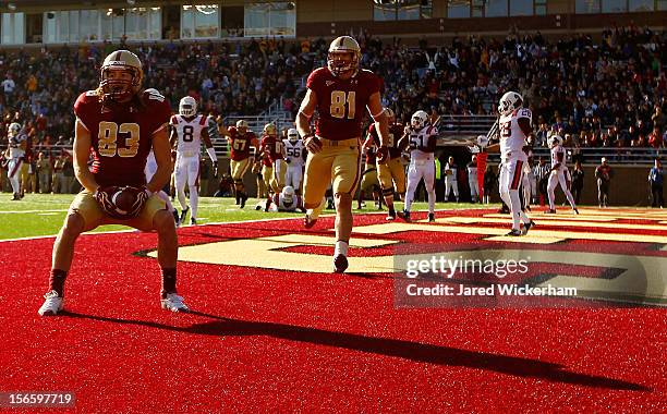Alex Amidon of the Boston College Eagles celebrates with teammate Chris Pantale after catching a touchdown pass against the Virginia Tech Hokies...