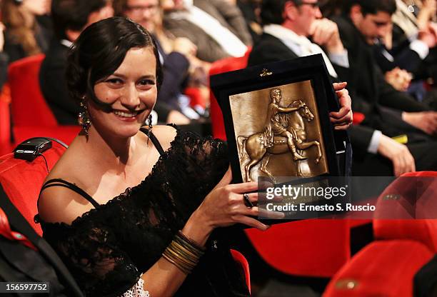 Director Ana-Felicia Scutelnicu poses with the CinemaXXI Award for Short and Medium Films for 'Panihida' during the Awards Ceremony at the 7th Rome...