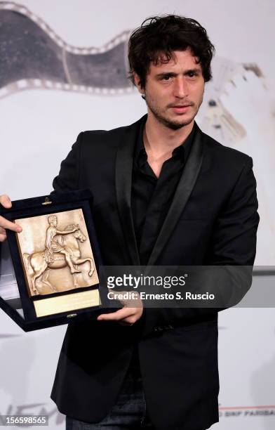 Actor Jeremy Elkaim with his Best Actor award for 'Main dans la main' at the Award Winners Photocall during the 7th Rome Film Festival at Auditorium...