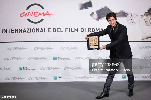 Actor Jeremy Elkaim with his Best Actor award for 'Main dans la main' at the Award Winners Photocall during the 7th Rome Film Festival at Auditorium...