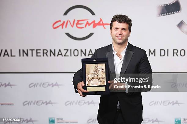 Arnau Valls Colomer poses with his Best Technical Contribution Award during the Award Winners Photocall during the 7th Rome Film Festival at...