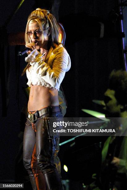 Singer Anastacia performs the official song for the 2002 World Cup Korea-Japan, "Boom", during final draw ceremonies in Pusan, 01 December 2001....