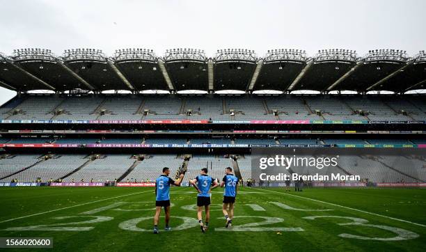 Dublin , Ireland - 30 July 2023; Dublin players, from left, James McCarthy, Michael Fitzsimons and Dean Rock walk out to the middle of the pitch...